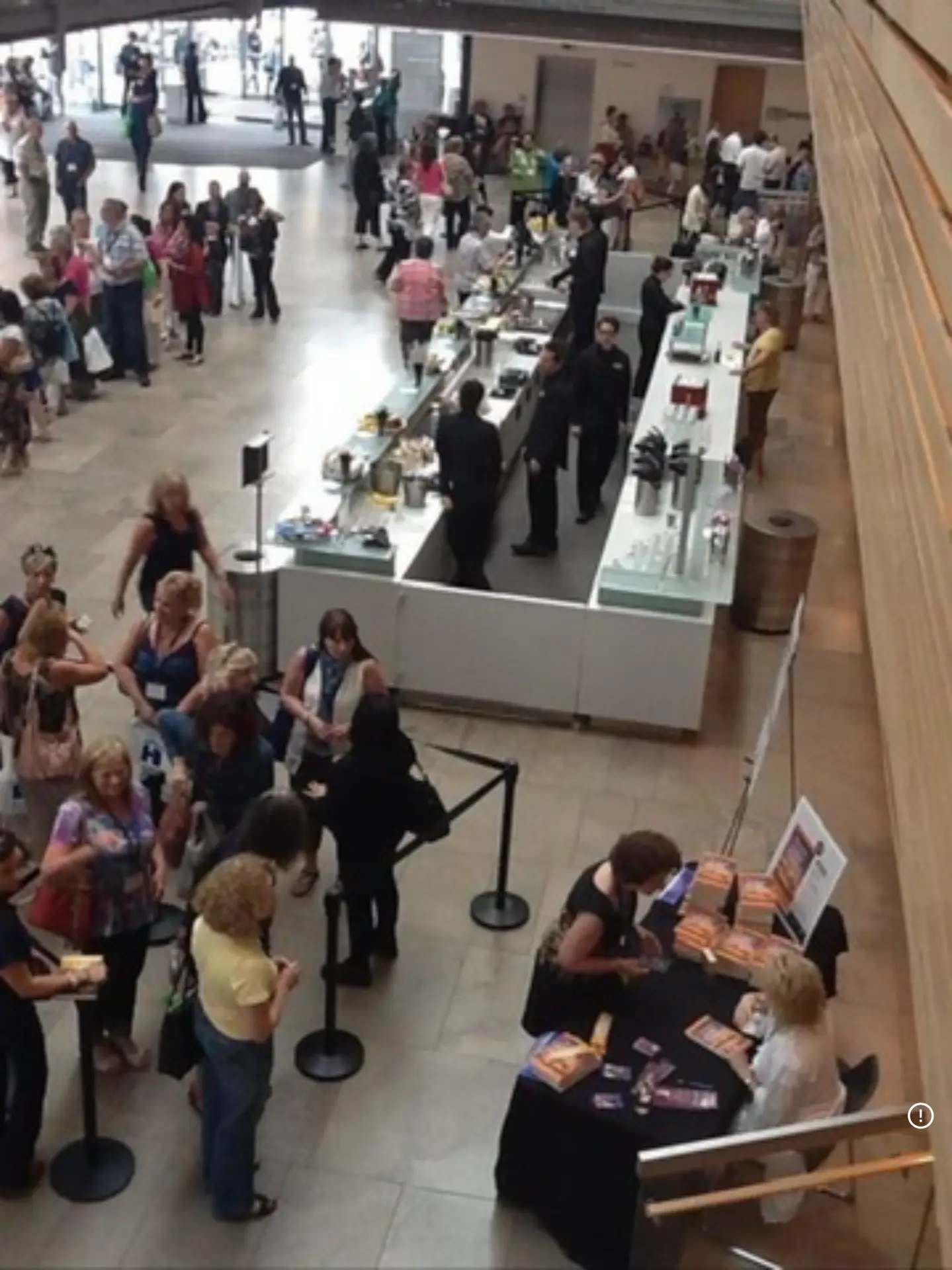 Crowds gathering around Kelly Sayers' book signing table at the Hay House I CAN DO IT Conference in Toronto